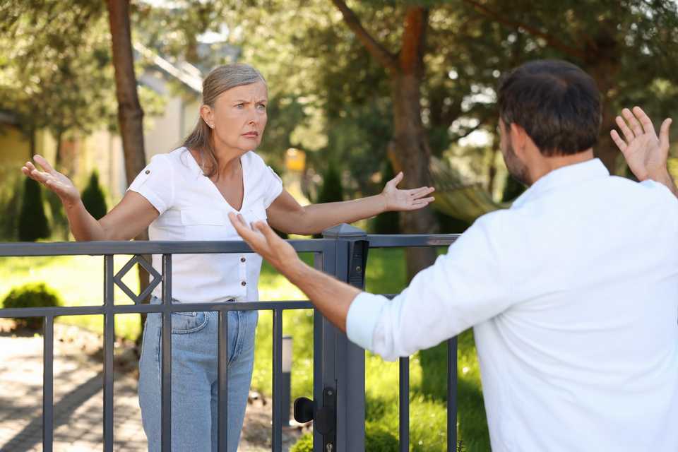 neighbors engaged in an emotional dispute over property lines