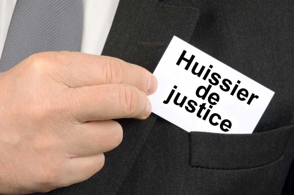 definition huissier justice