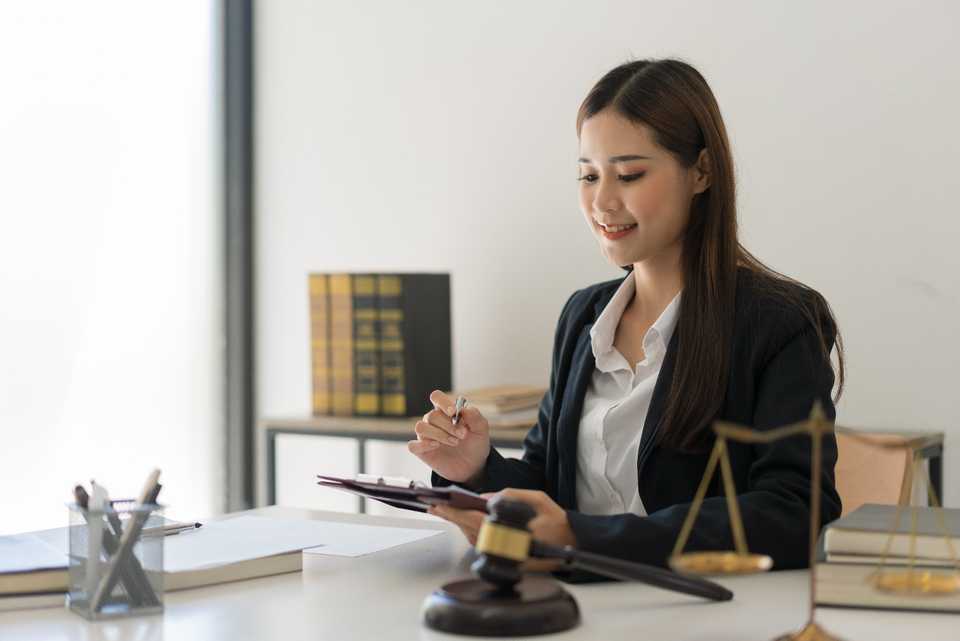 female lawyer preparing briefs