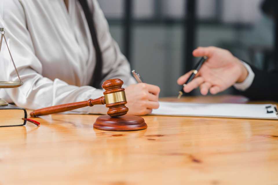 client getting advice from a divorce lawyer
